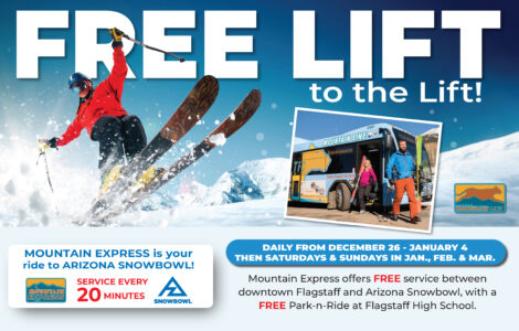 A skier descends a snowy slope as the Mountain Express bus waits nearby. Enjoy free rides to Arizona Snowbowl from Flagstaff during the 2025-2026 season, with service every 20 minutes starting December 26.